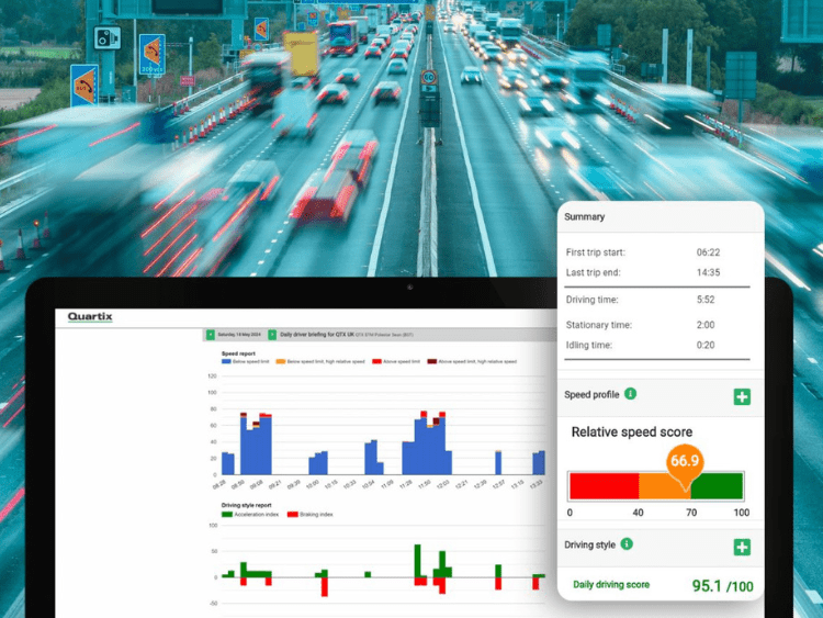 Traffic flows on a highway over a dashboard displaying driving analytics, including speed and driver scores by Quartix.