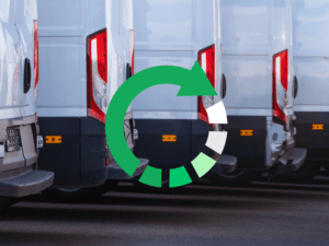 Rear view of a row of parked delivery vans with a green circular arrow overlay, symbolizing movement or recycling.