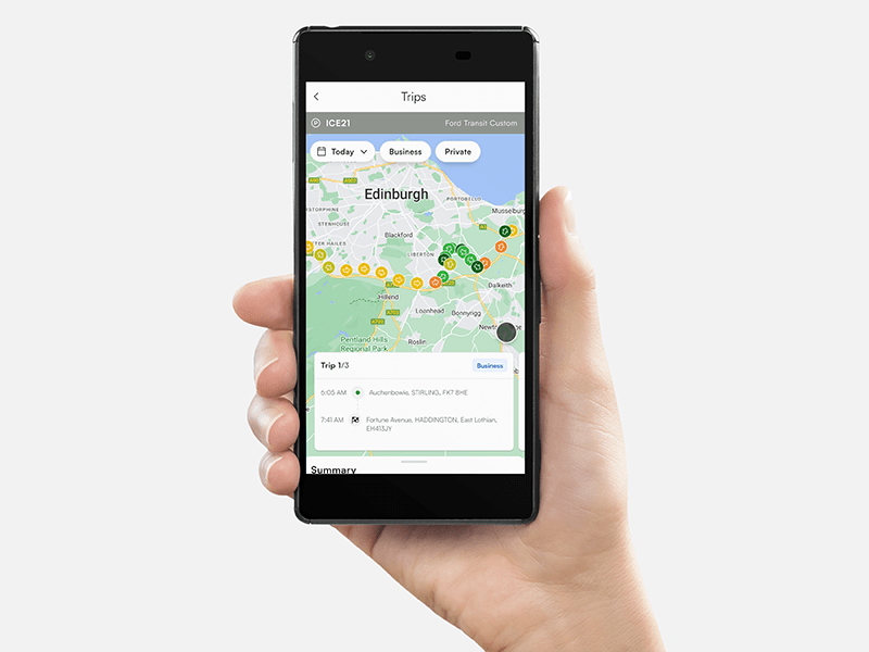 A person holds a smartphone displaying a map with trip details and locations around Edinburgh, seamlessly integrating electric vehicle tracking for an eco-friendly journey.